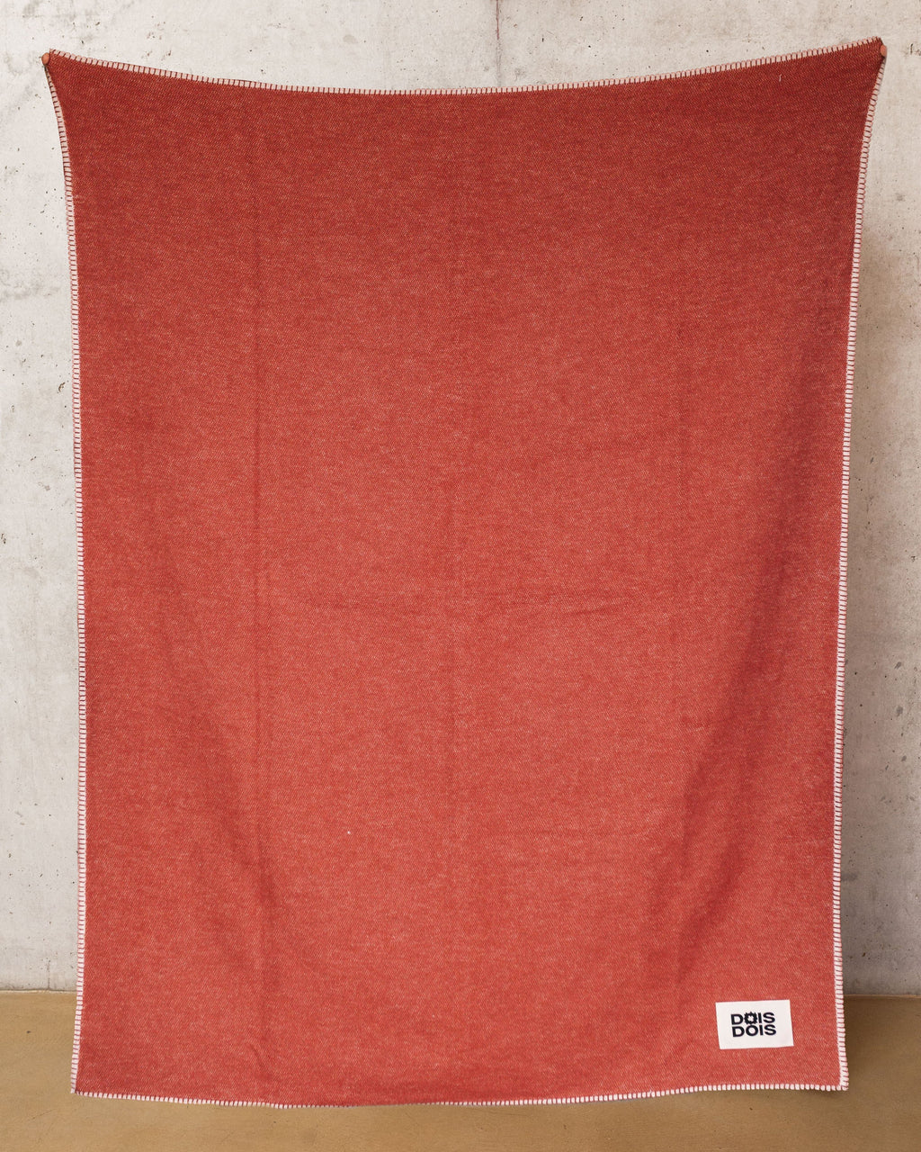 Kuscheldecke in Terracotta-Orange aus 100 % Baumwolle, gewebt in Portugal
